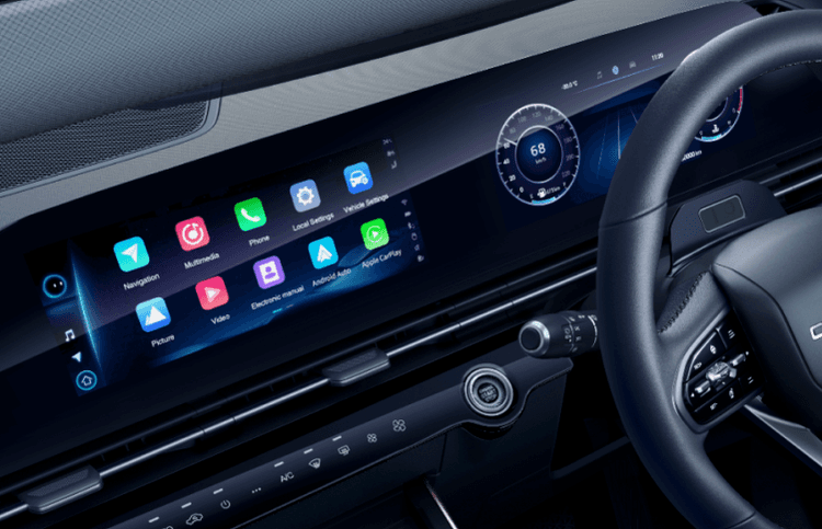 Interior Chery OMODA C5 menampilkan layar digital lebar dengan sistem infotainment terintegrasi. Panel instrumen full digital, konektivitas pintar, dan tata letak modern.