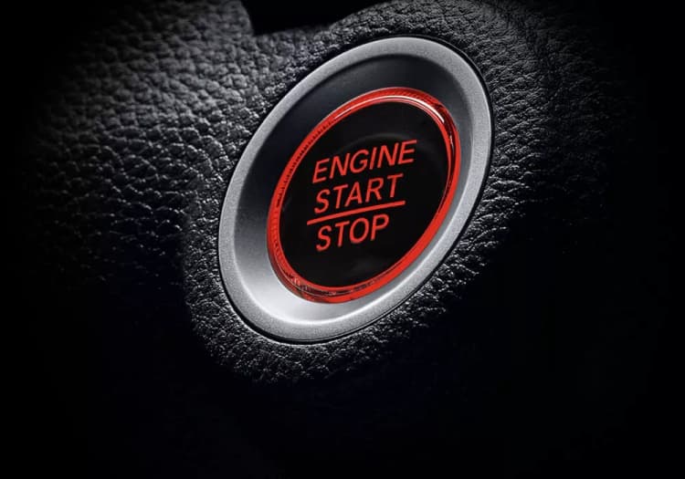 One Push Ignition System merupakan sistem starter mobil tanpa kunci konvensional (tanpa diputar), cukup tekan tombol untuk menyalakan atau mematikan mesin.