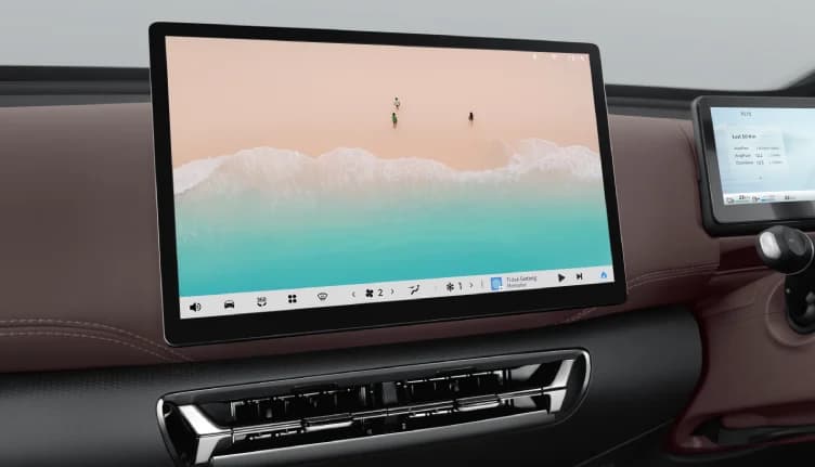 Layar sentuh infotainment besar bergaya floating yang menjadi pusat kendali utama mobil.